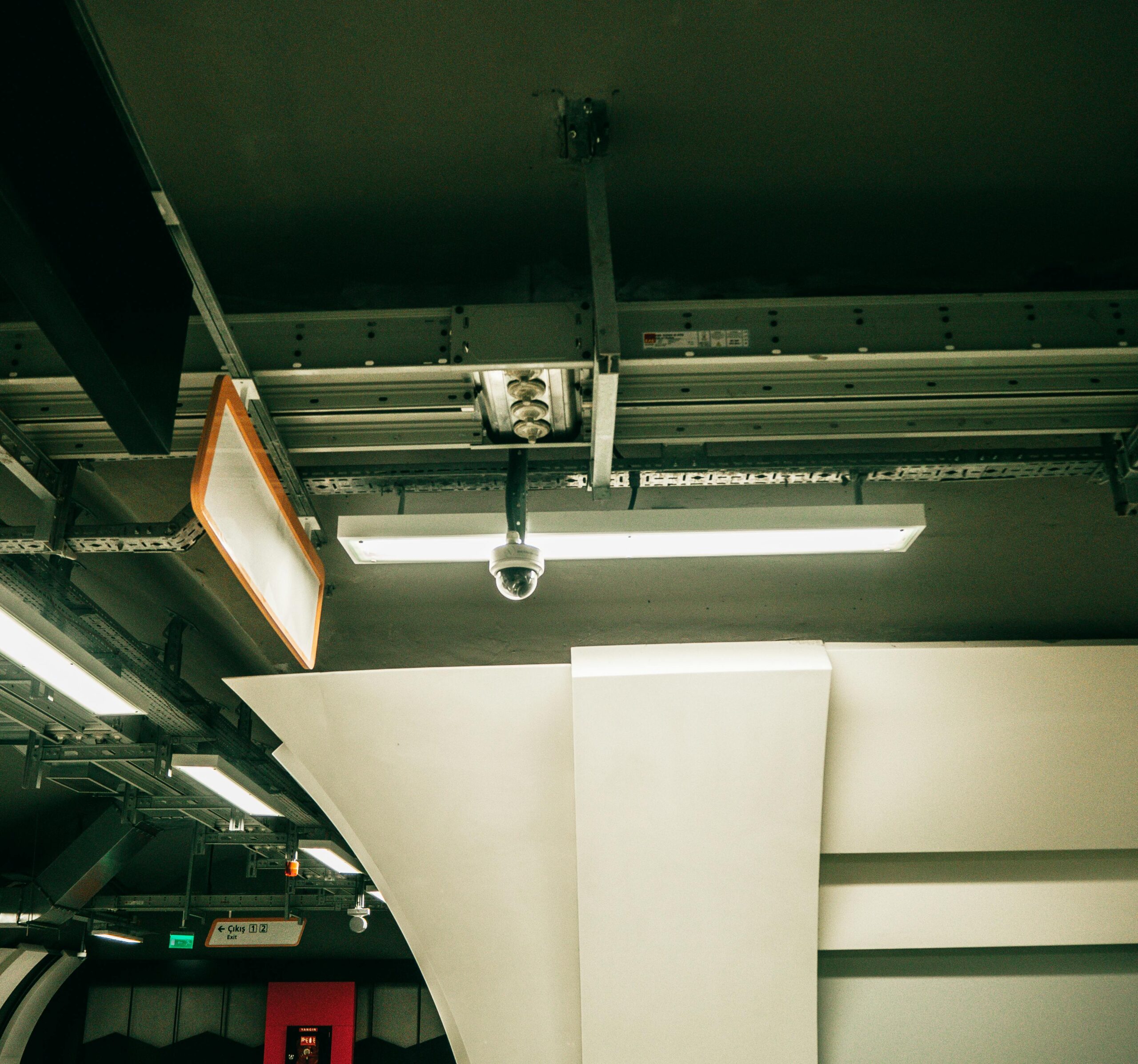A modern underground car park with security cameras in İstanbul, Turkey.
